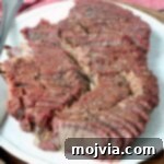 sliced smoked chuck roast on plate