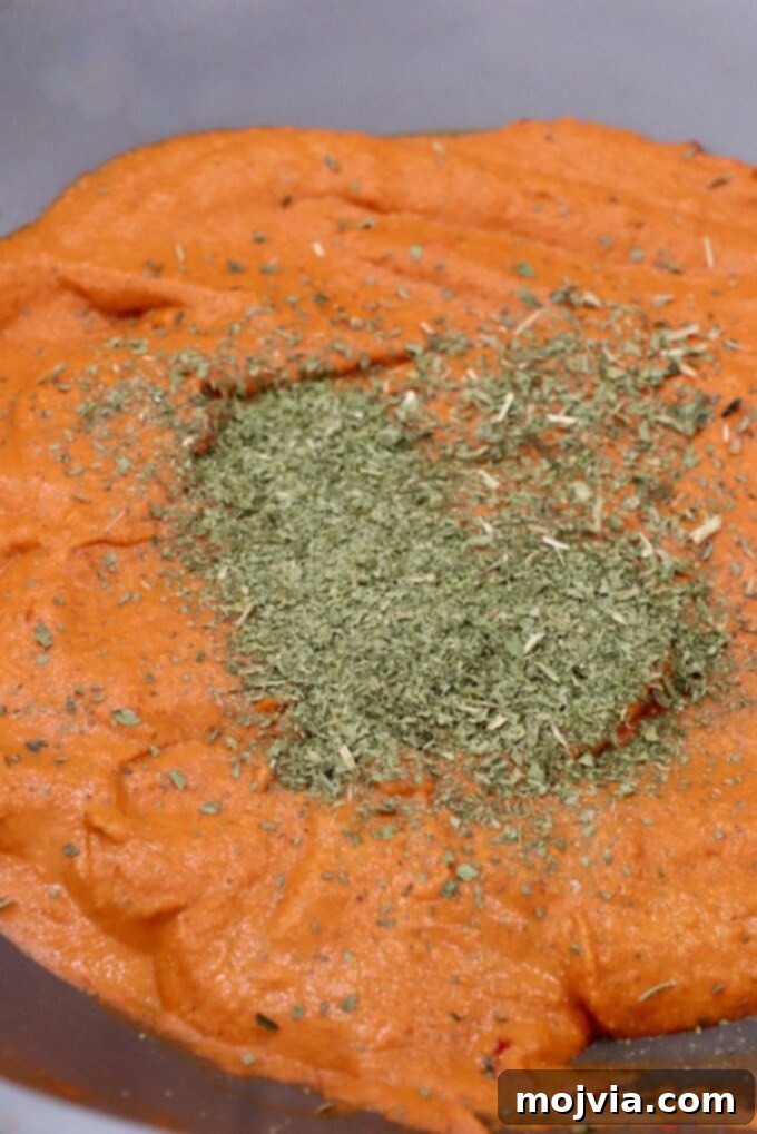 Buttery Paneer Indulgence 9 curry sauce with fenugreek leaves in large pan