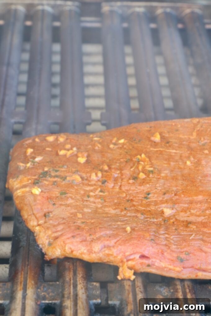 Sizzling Flank Steak Tacos 8 marinated flank steak on grill