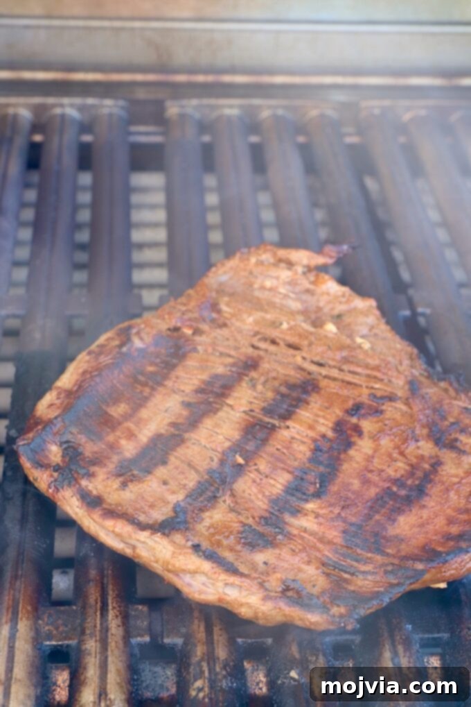 Sizzling Flank Steak Tacos 9 grilled flank steak on grill
