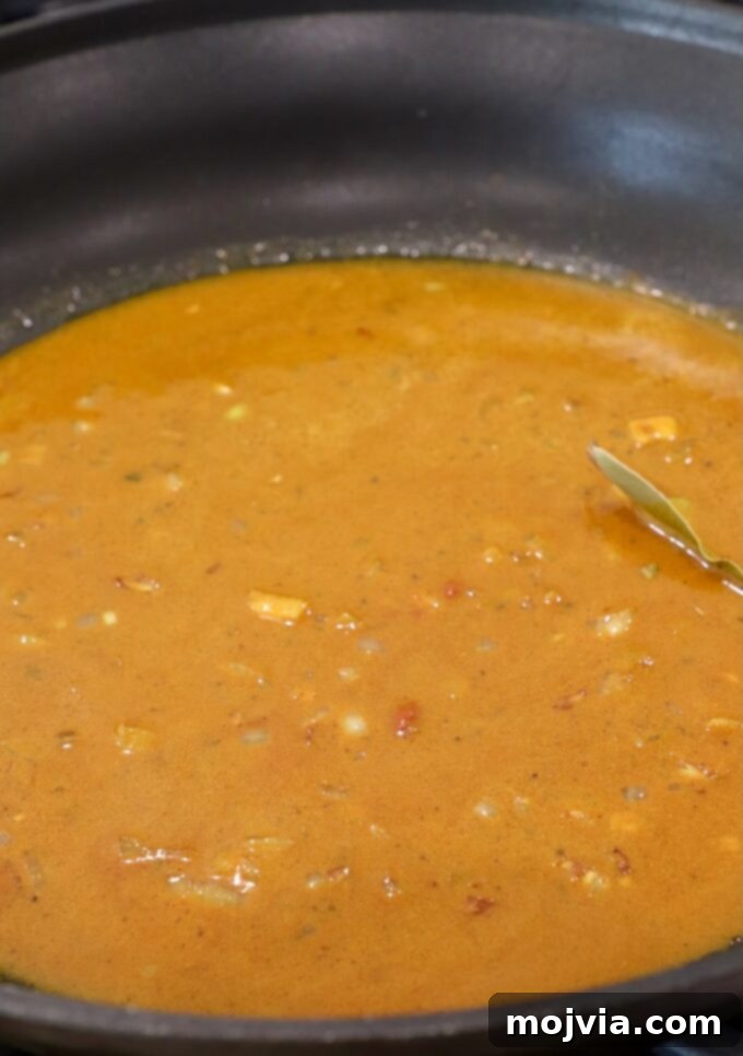 Crown Jewel Chicken Salad 5 curry sauce in a skillet