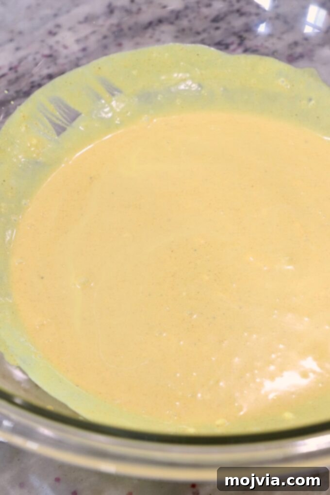 Crown Jewel Chicken Salad 8 creamy curry sauce in a glass bowl