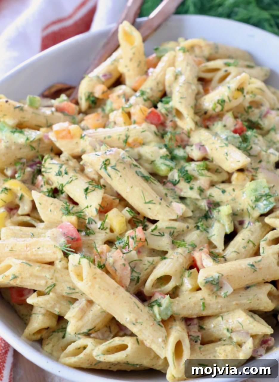 Refreshing Greek Yogurt Pasta Salad 2 Large bowl of creamy pasta salad tossed with a Greek yogurt dressing, ready to serve