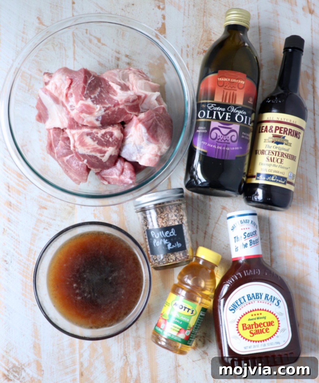 Quick and Tender Pressure Cooker Pork 3 pulled pork ingredients on white wood board