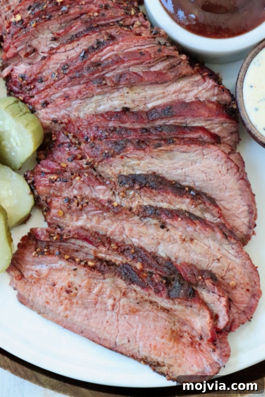 sliced smoked tri tip on plate
