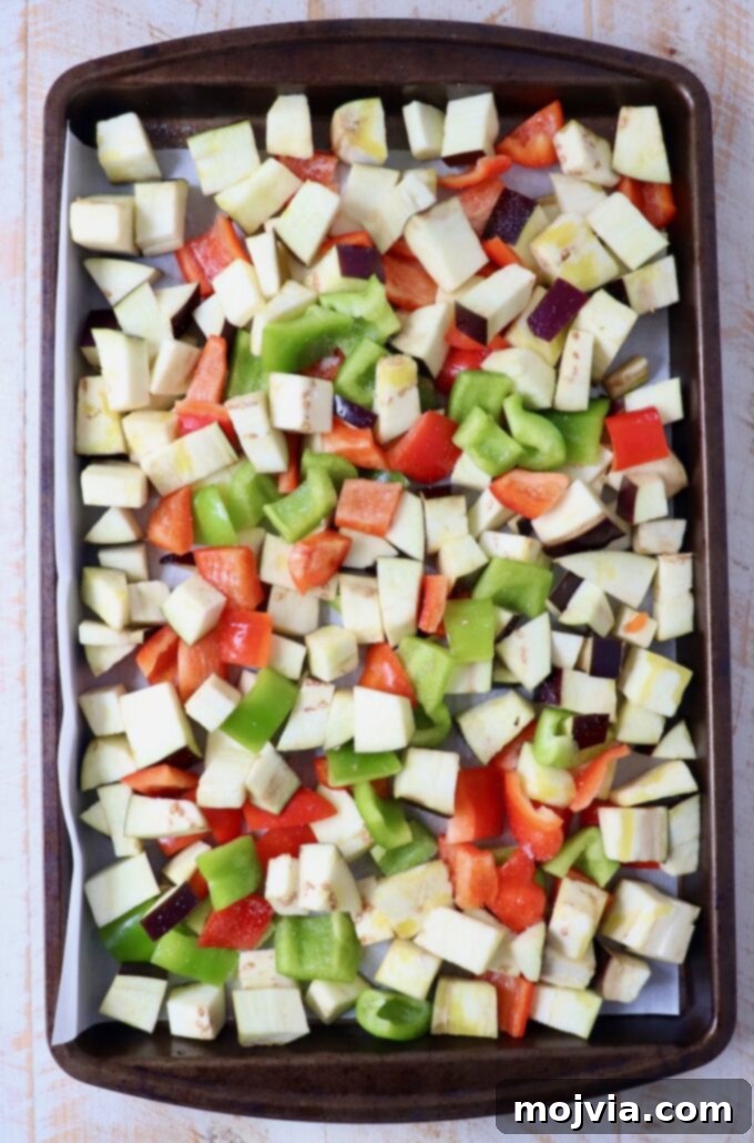 Smoky Eggplant Salad 4 diced eggplant and bell peppers on baking sheet