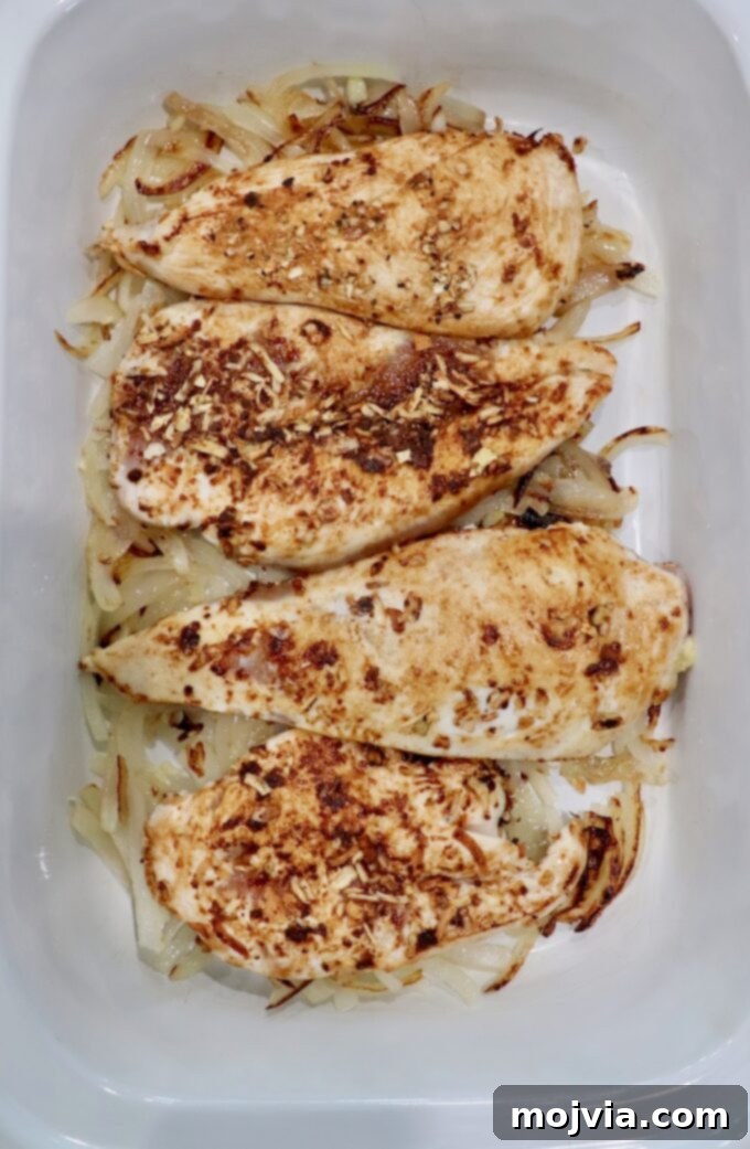 Rich Slow Cooker French Onion Chicken 8 Seasoned, seared chicken breasts in a slow cooker with caramelized onions.