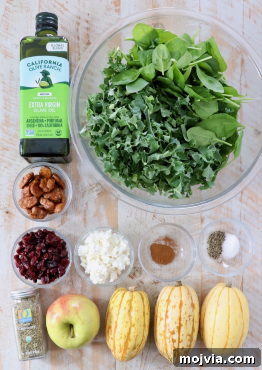 Roasted Delicata Harvest Bowl 3 ingredients for delicata squash salad on white wood board