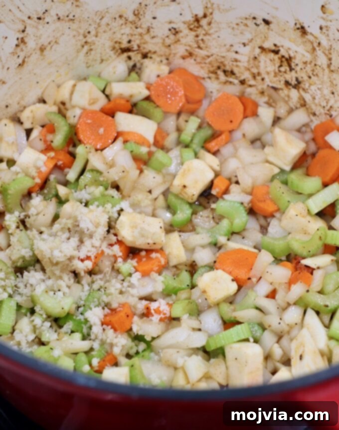 Melt-Off-The-Bone Guinness Short Ribs 7 diced vegetables in dutch oven