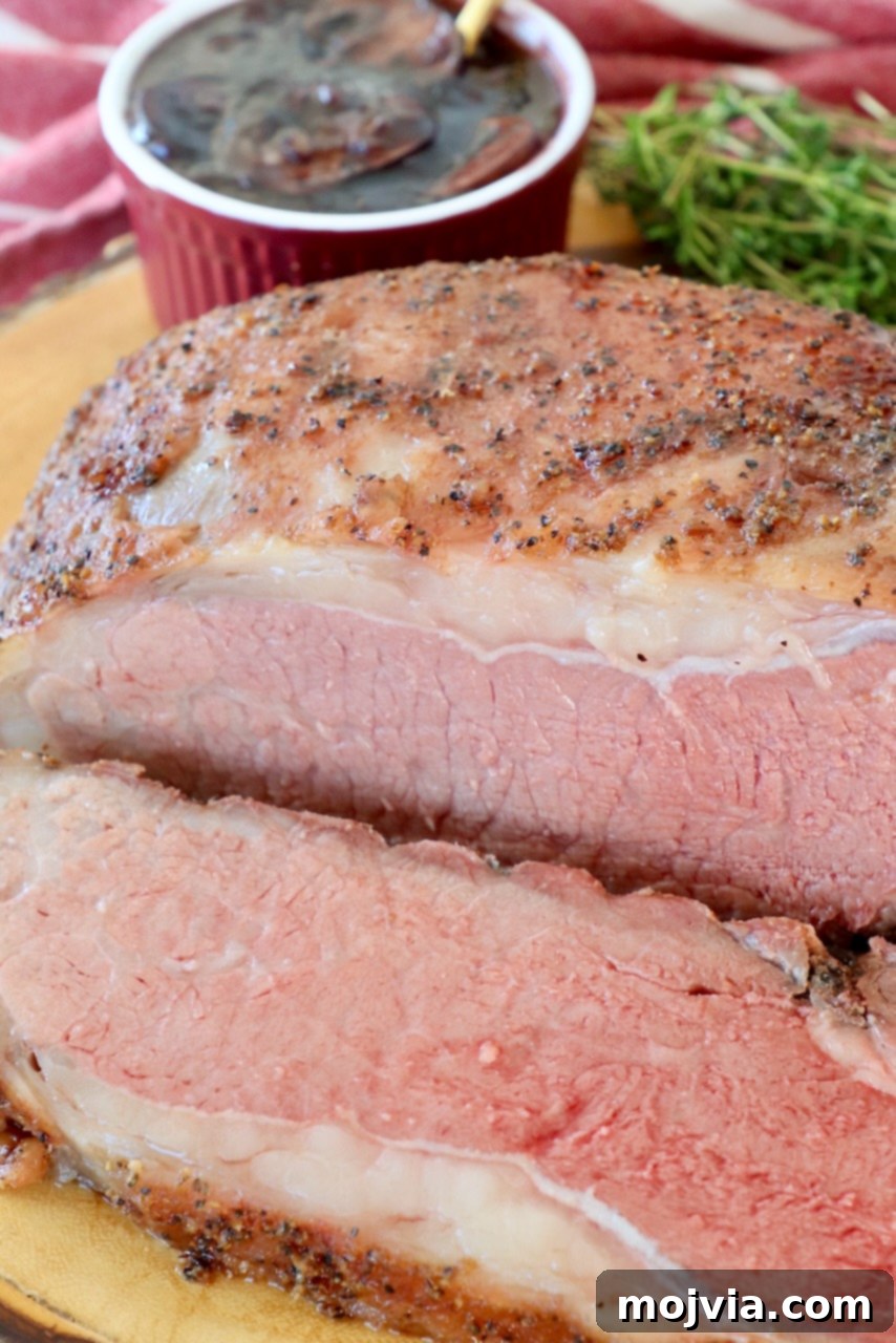 Slow Smoked New York Strip Roast 14 smoked strip roast, sliced on wood serving tray