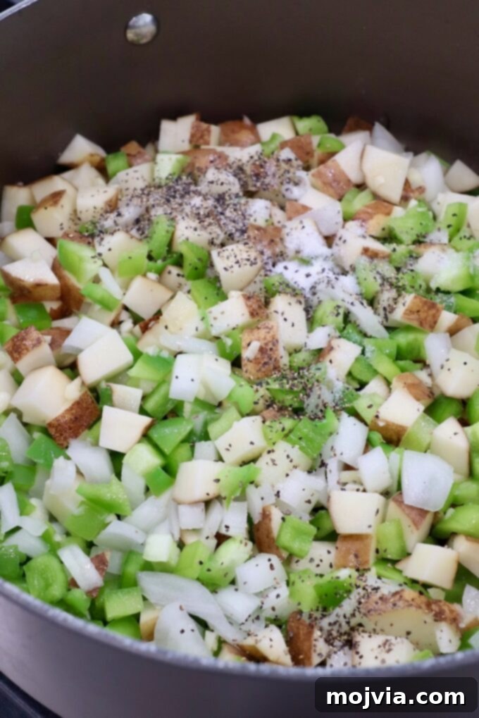 Philly Cheesesteak Skillet 5 seasoned diced potatoes and vegetables in dutch oven