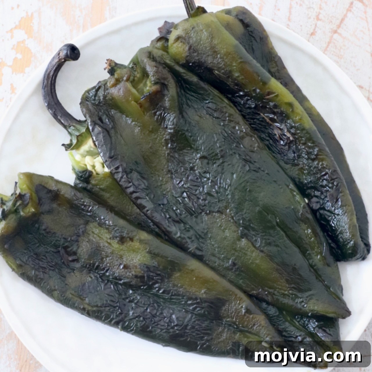 roasted poblano peppers on plate