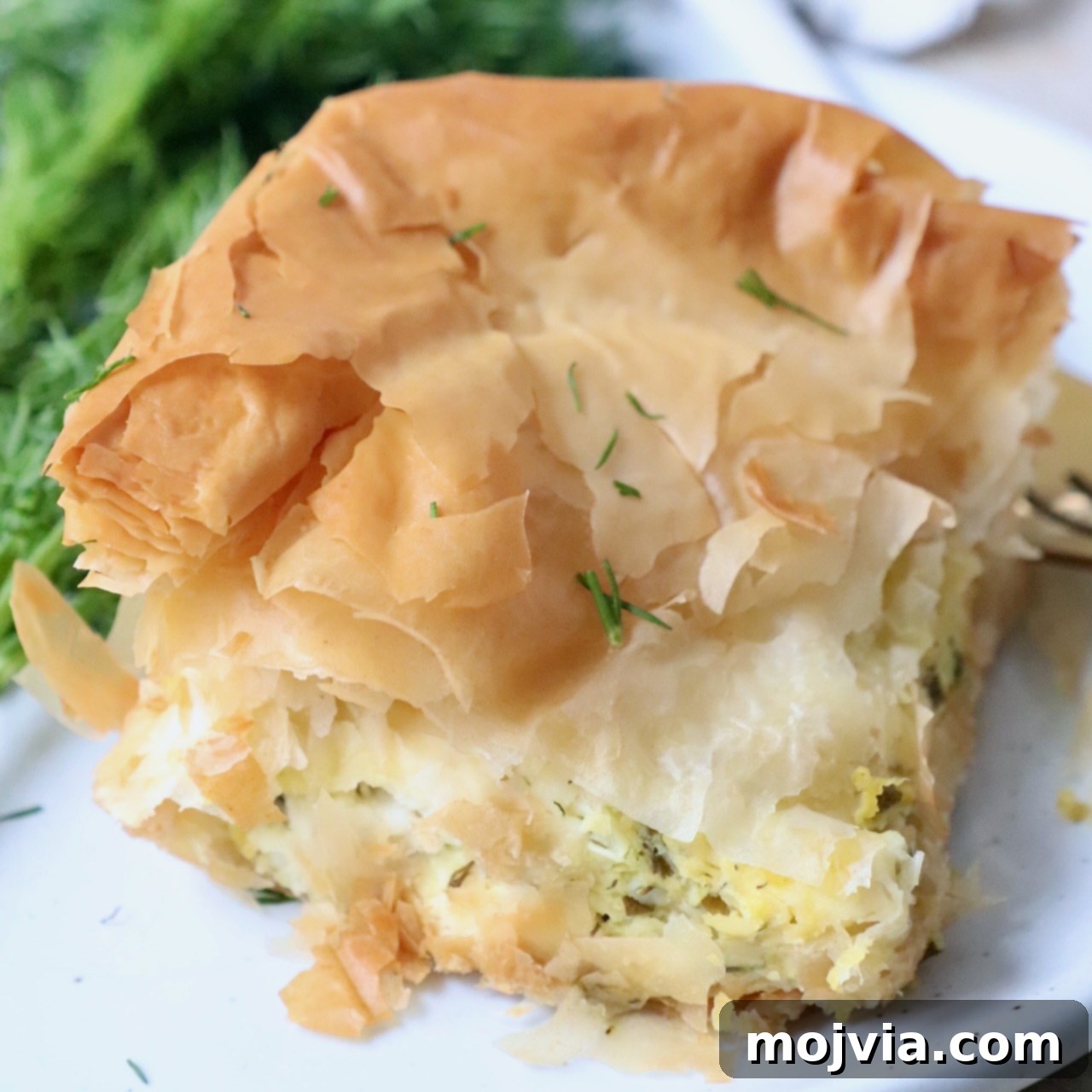 piece of Greek zucchini pie on plate
