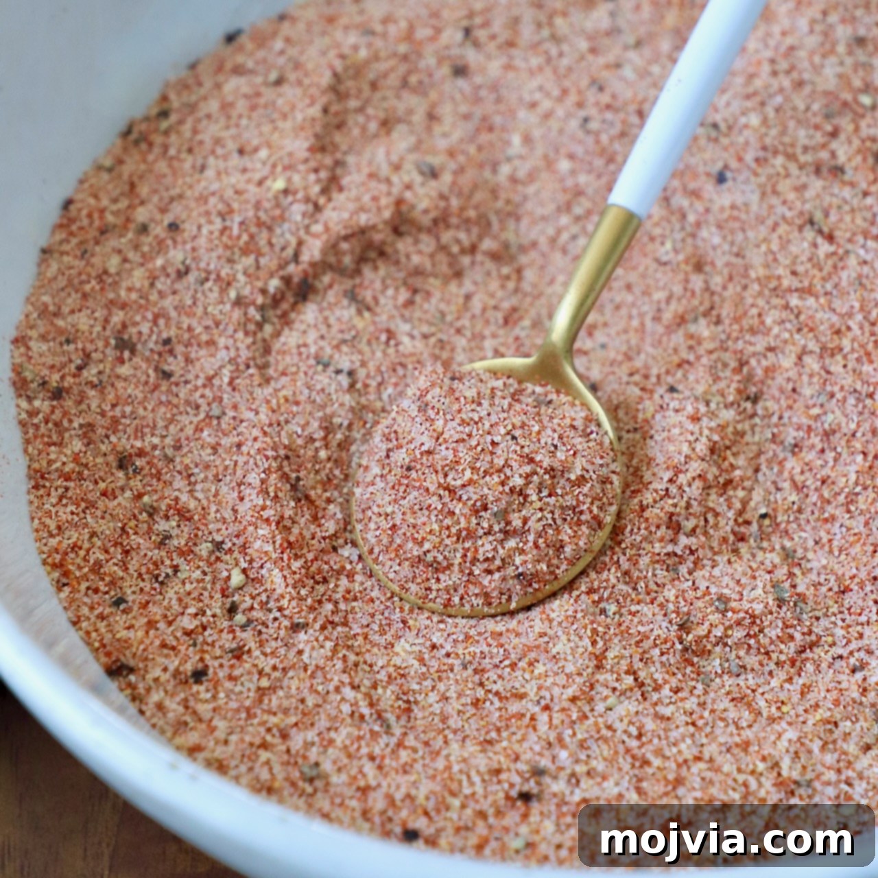 fry seasoning in bowl with small spoon