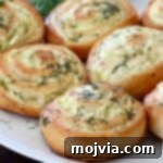 baked pickle rolls on a plate