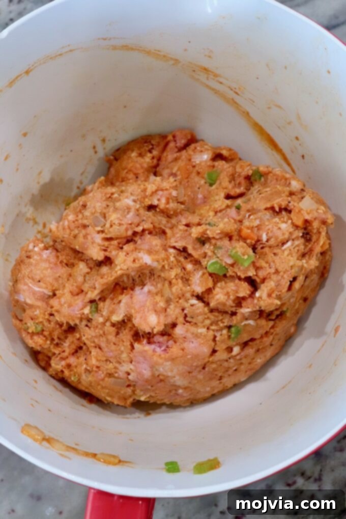 Zesty Buffalo Chicken Poppers 6 Raw buffalo chicken meatball mixture thoroughly combined in a large bowl