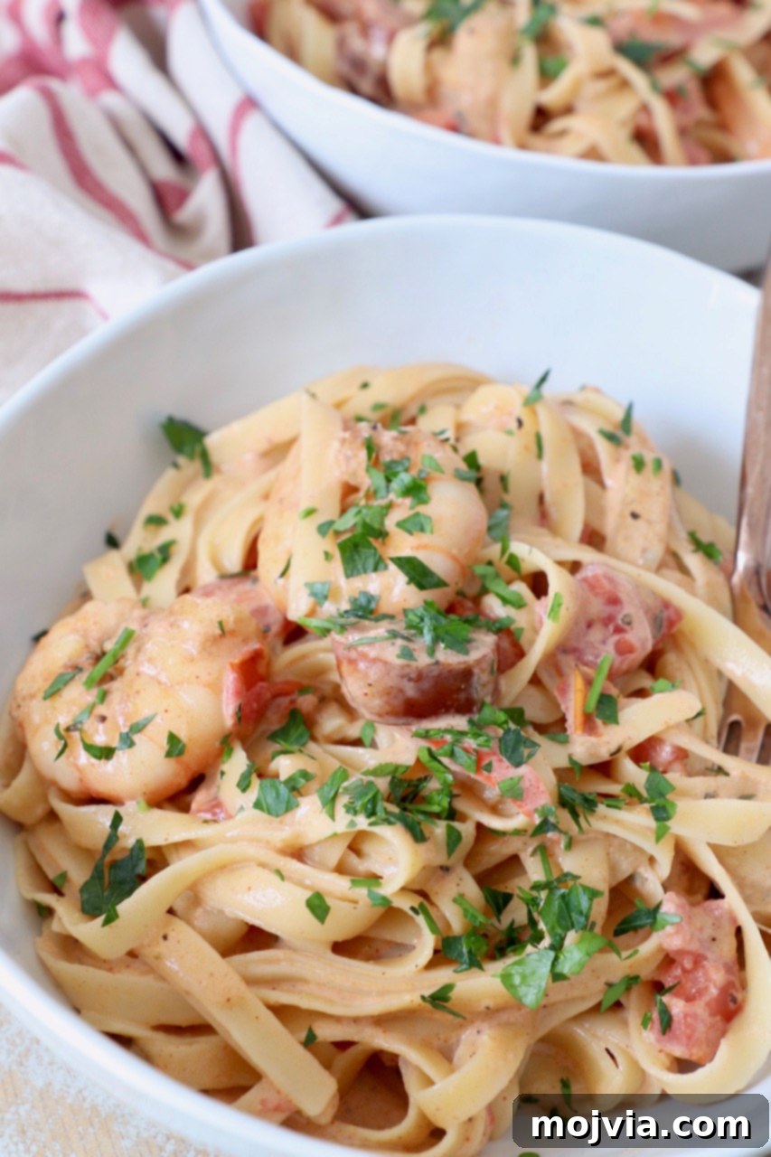 Spicy Cajun Shrimp and Sausage Pasta 2 cooked pasta in bowl with shrimp and sausage