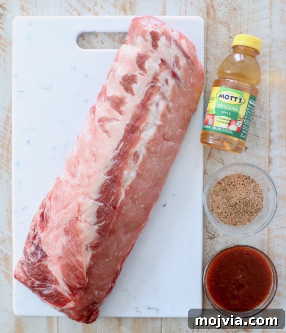Fall Off The Bone Instant Pot Ribs 3 ingredients for instant pot ribs on white wood board