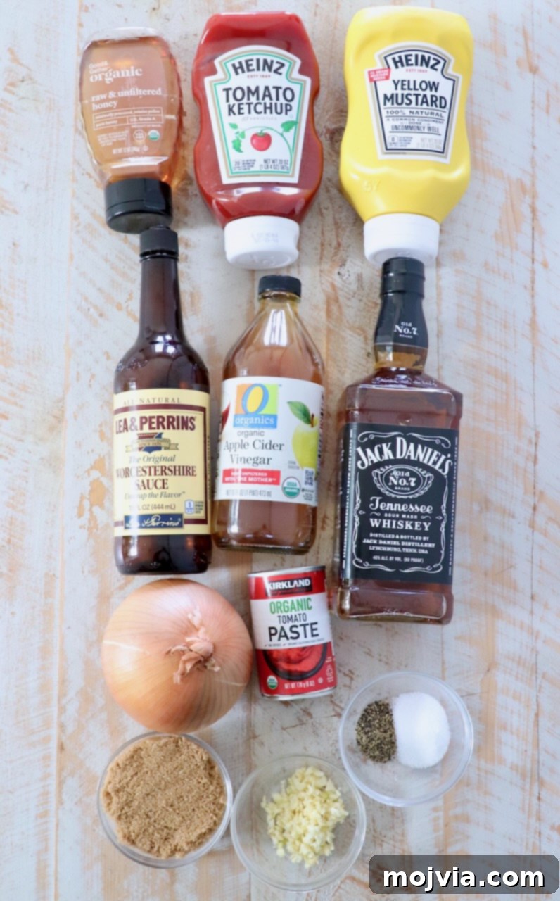 Jack Daniel's: The Taste of Tennessee BBQ 3 Carefully arranged ingredients for Jack Daniel's BBQ sauce on a clean white wooden board, ready for preparation.