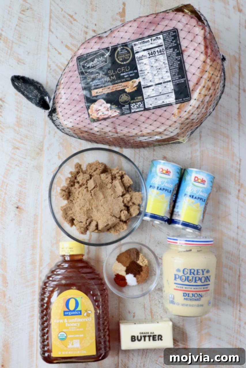Golden Honey Glazed Ham Feast 3 Ingredients laid out on a white wooden board, ready for making honey baked ham.
