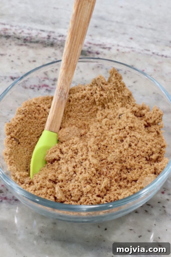 Golden Honey Glazed Ham Feast 7 Brown sugar and spice mixture in a bowl for the caramelized crust.