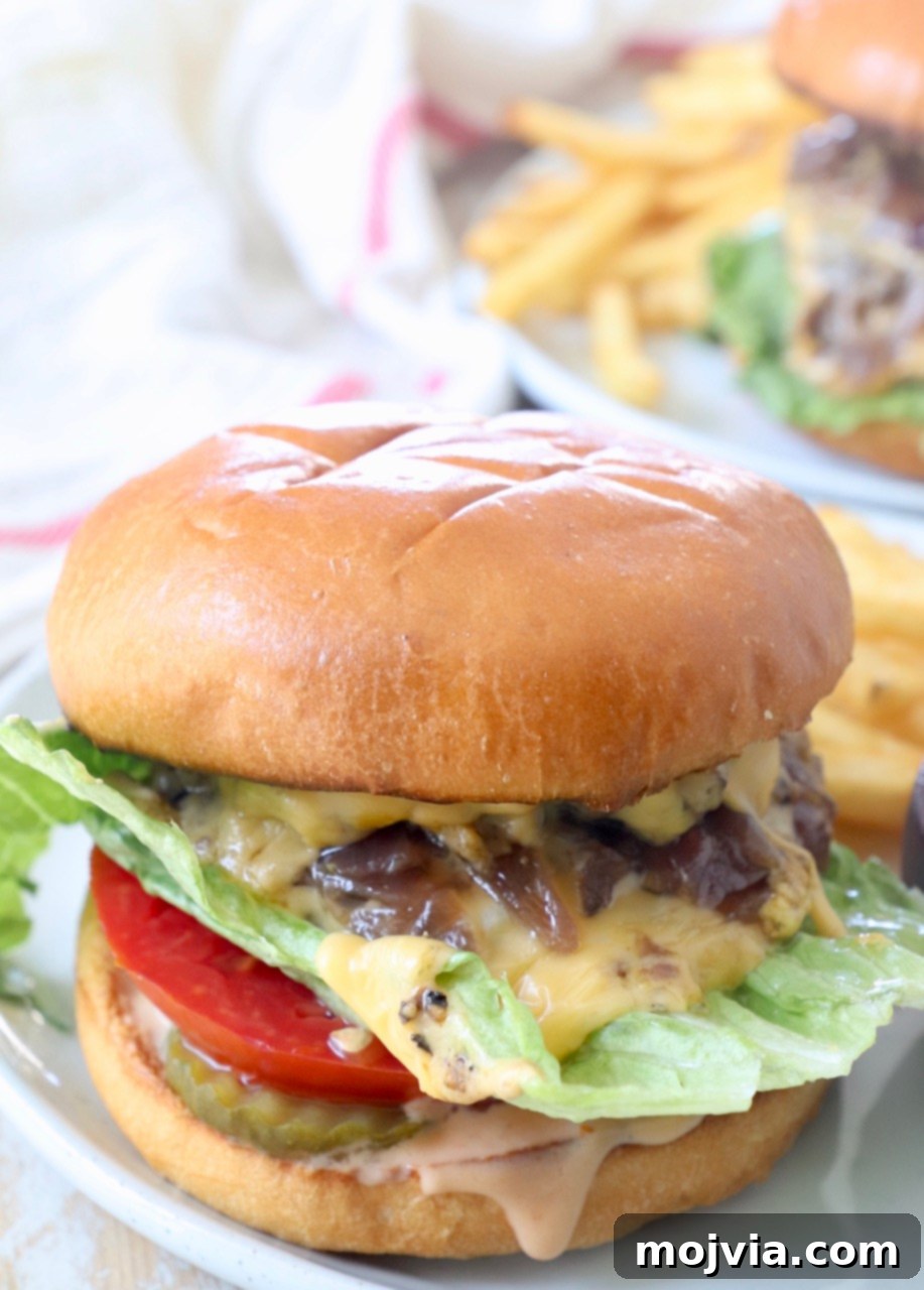 Secret Burger Sauce 6 A delicious homemade Animal Style Burger, generously topped with burger sauce, on a plate ready to be enjoyed