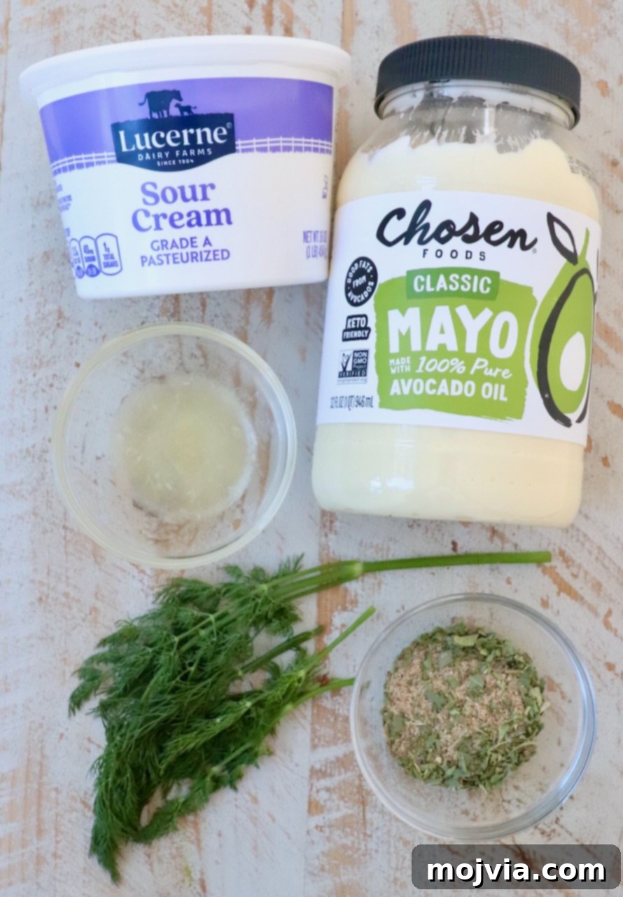 Garden Vegetable Dip 3 ingredients for vegetable dip on white wood board