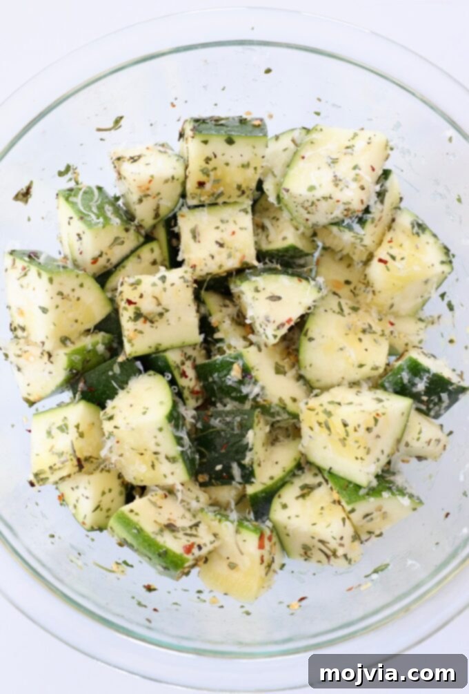 Mastering Zucchini: Your Essential Cooking Guide 12 seasoned diced zucchini in bowl