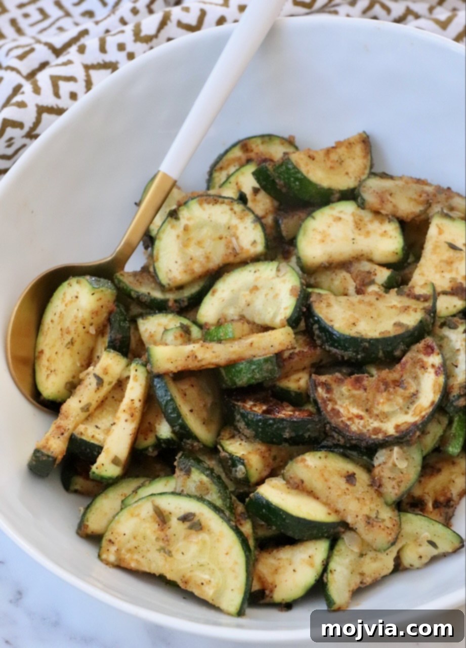 Mastering Zucchini: Your Essential Cooking Guide 18 sauteed zucchini in bowl with spoon