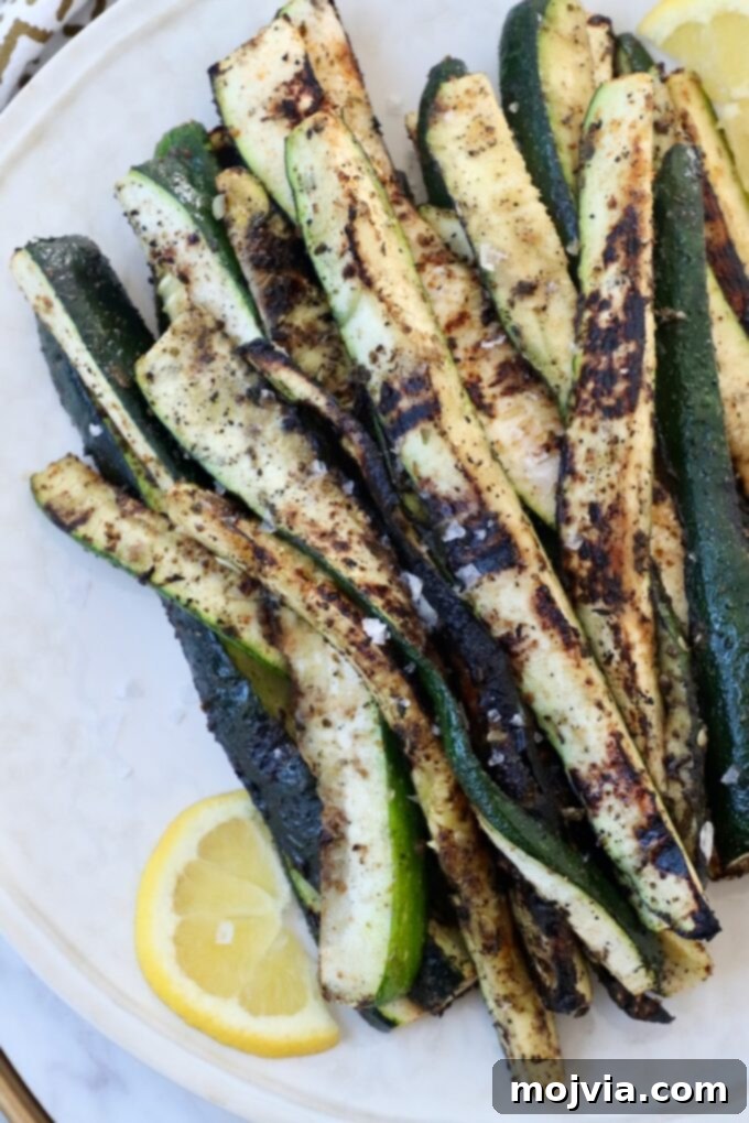 Mastering Zucchini: Your Essential Cooking Guide 5 grilled zucchini spears on plate