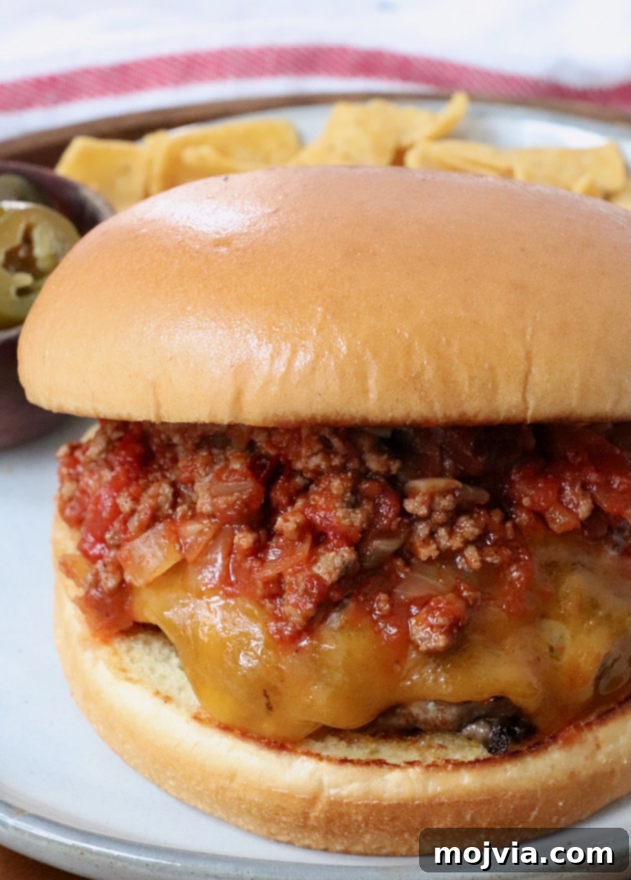 Robust Chili Burger 2 Classic Chili Cheeseburger on a plate, garnished for serving
