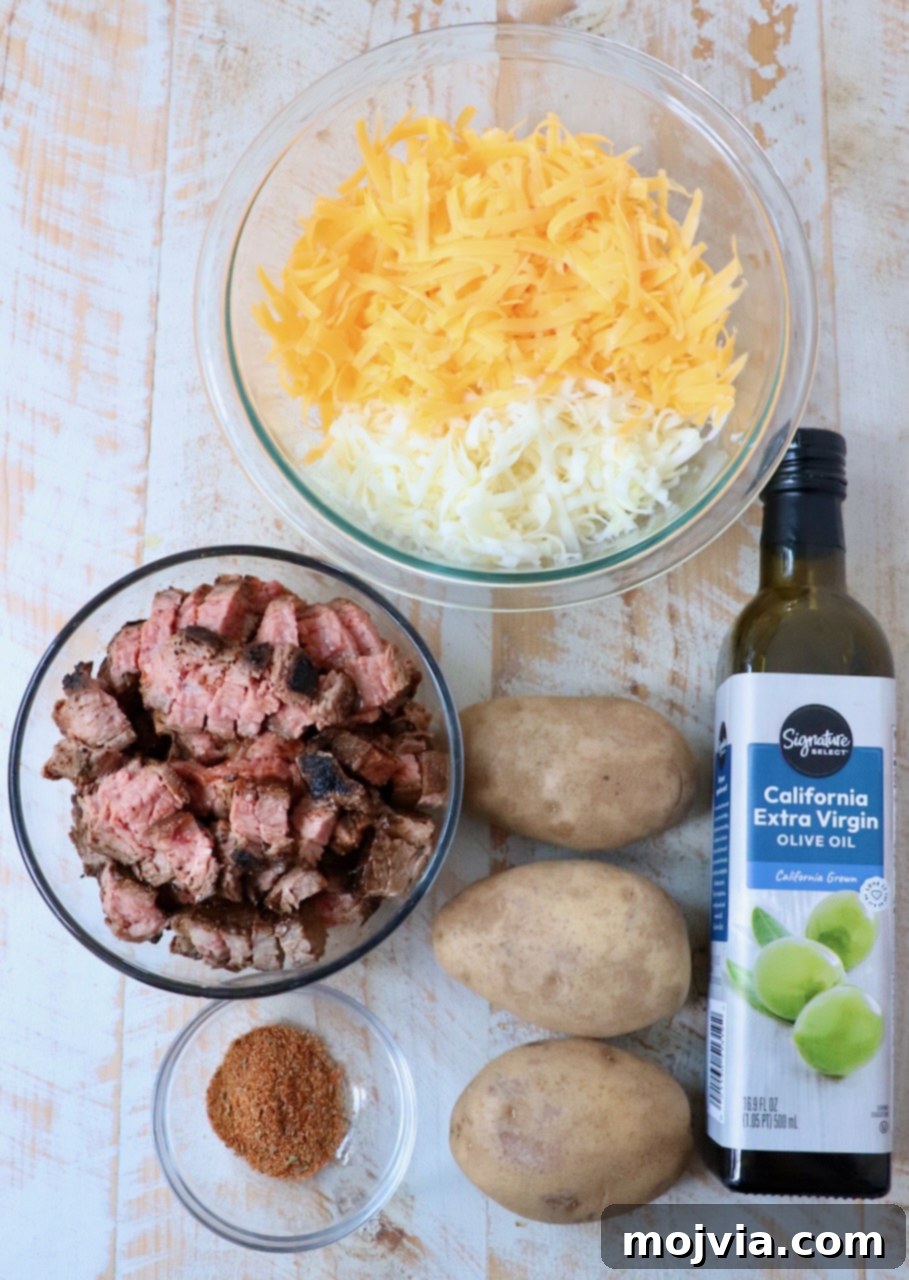 Ultimate Grilled Steak Fries 3 ingredients for carne asada fries on white wood board