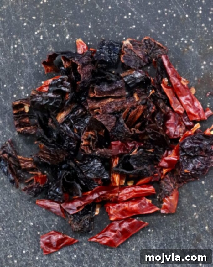 Salsa Macha 4 chopped dried chilies on a cutting board