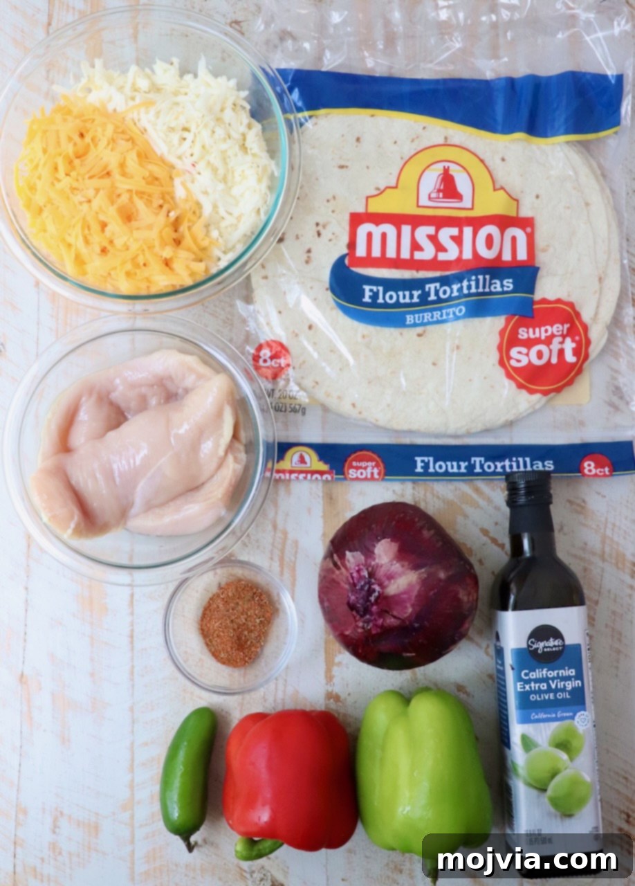 Golden Grilled Chicken Quesadillas 3 ingredients for chicken quesadillas on white wood board