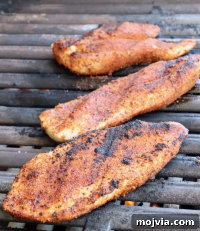 Golden Grilled Chicken Quesadillas 4 seasoned grilled chicken on a grill