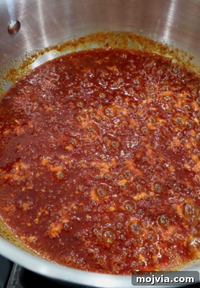 Calabrian Fire Pasta 5 nduja and melted butter mixed together in a pan