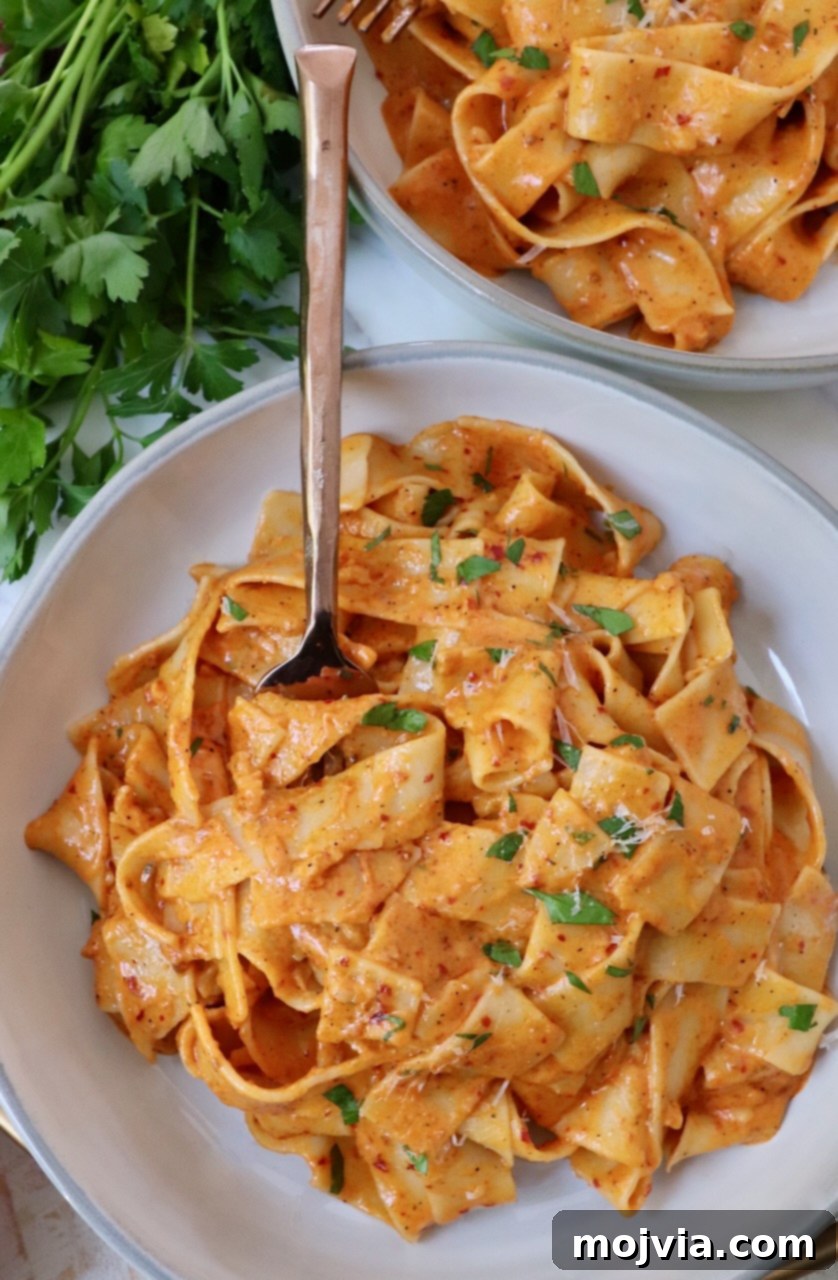 Calabrian Fire Pasta 8 nduja pasta in bowl with fork