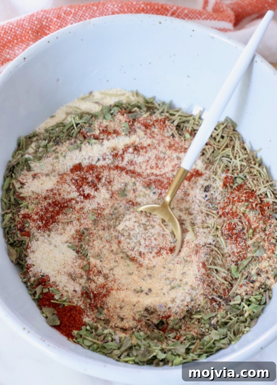 Ultimate Beef Stew Spice Mix 2 dried herbs and spices combined in a bowl with a spoon