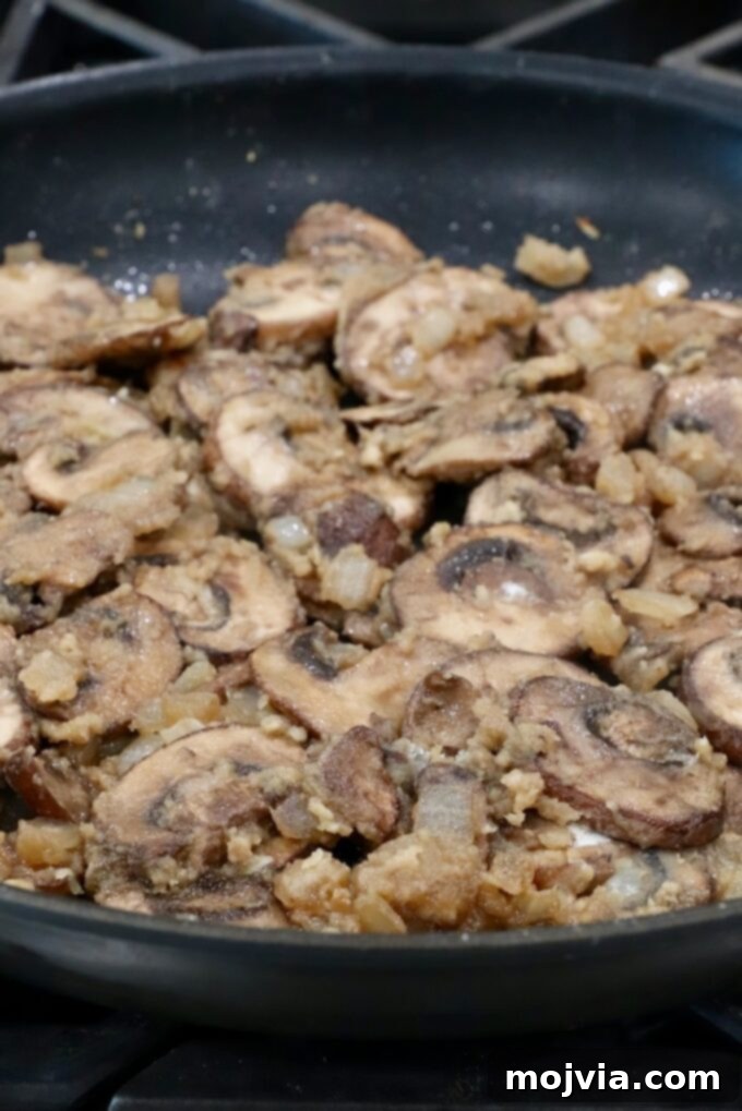 Wild Mushroom Gravy 7 All-purpose flour sprinkled over the butter and mushroom mixture, forming a roux as it cooks.
