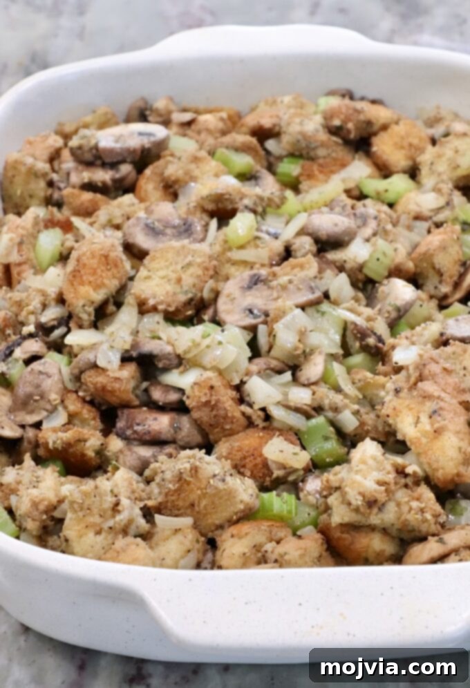 Umami Mushroom Stuffing 9 The prepared mushroom stuffing transferred into a 9x13 inch casserole dish, ready for baking to meld all the rich flavors.