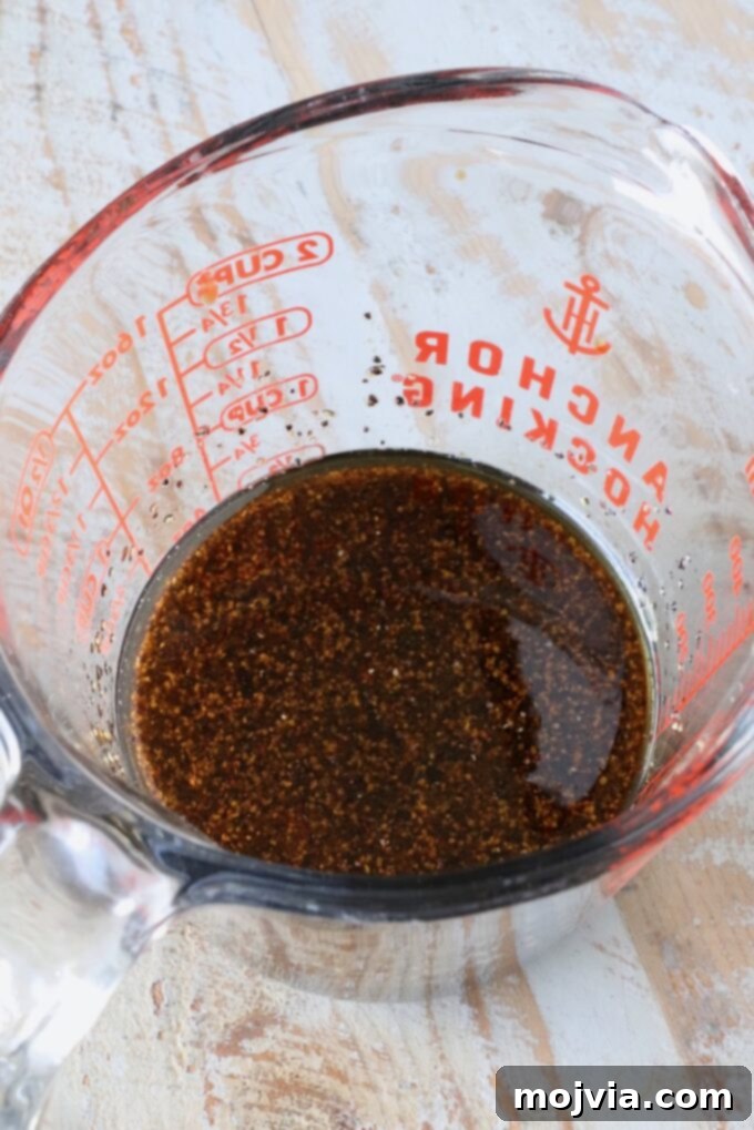 black pepper sauce in a glass measuring cup