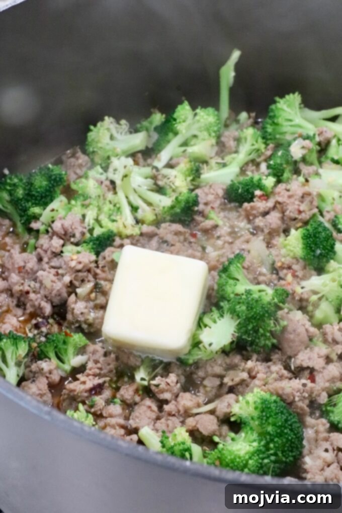 Savory Sausage and Broccoli Orecchiette 7 cooked sausage and broccoli in a large pot with butter