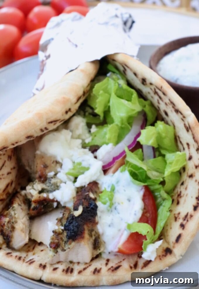 Greek Style Chicken Gyros 8 chicken gyros on a plate