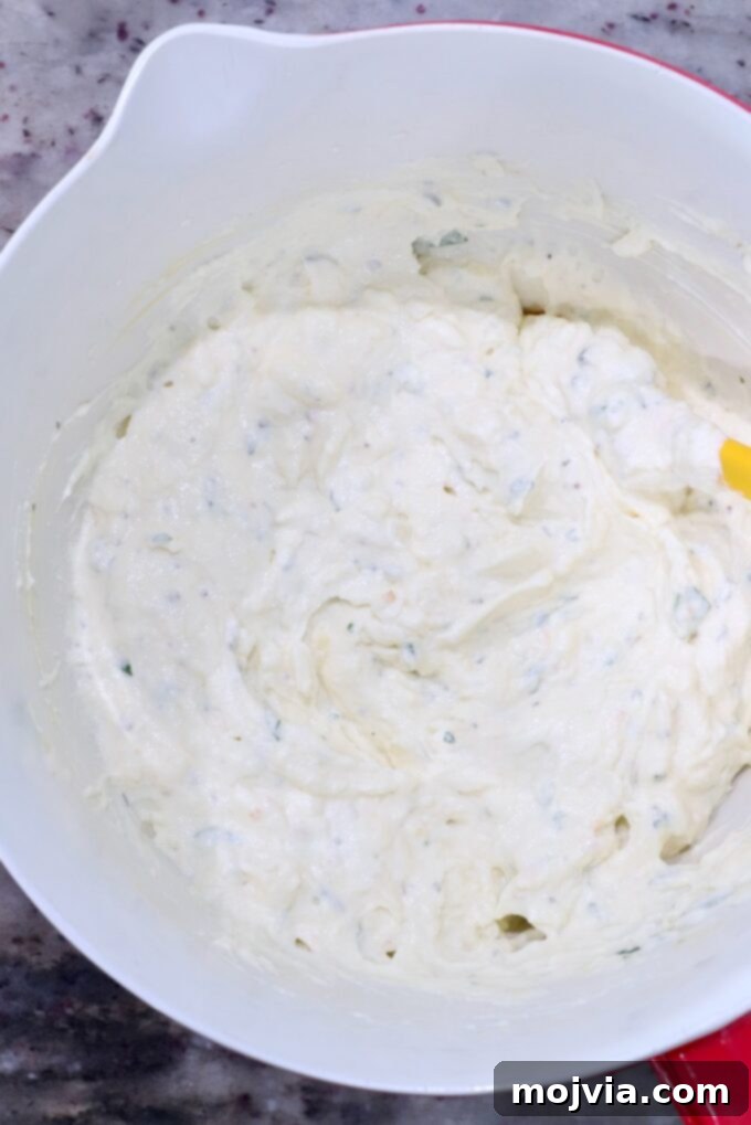 Cheesy Baked Stuffed Shells 5 seasoned ricotta cheese in a large mixing bowl