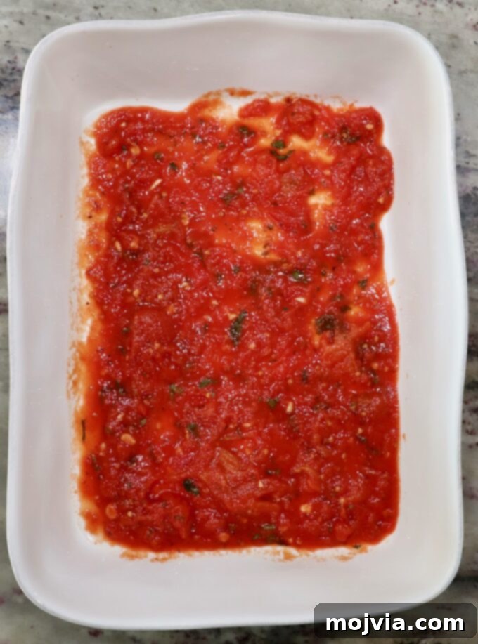 Cheesy Baked Stuffed Shells 6 marinara sauce in the bottom of a casserole dish