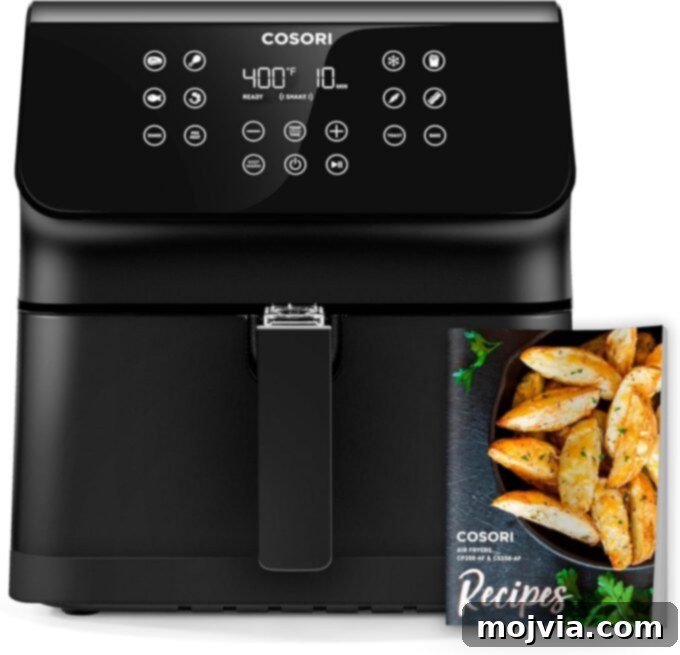 Golden Air Fryer Meatloaf 11 Cosori air fryer with recipe book in front of the air fryer
