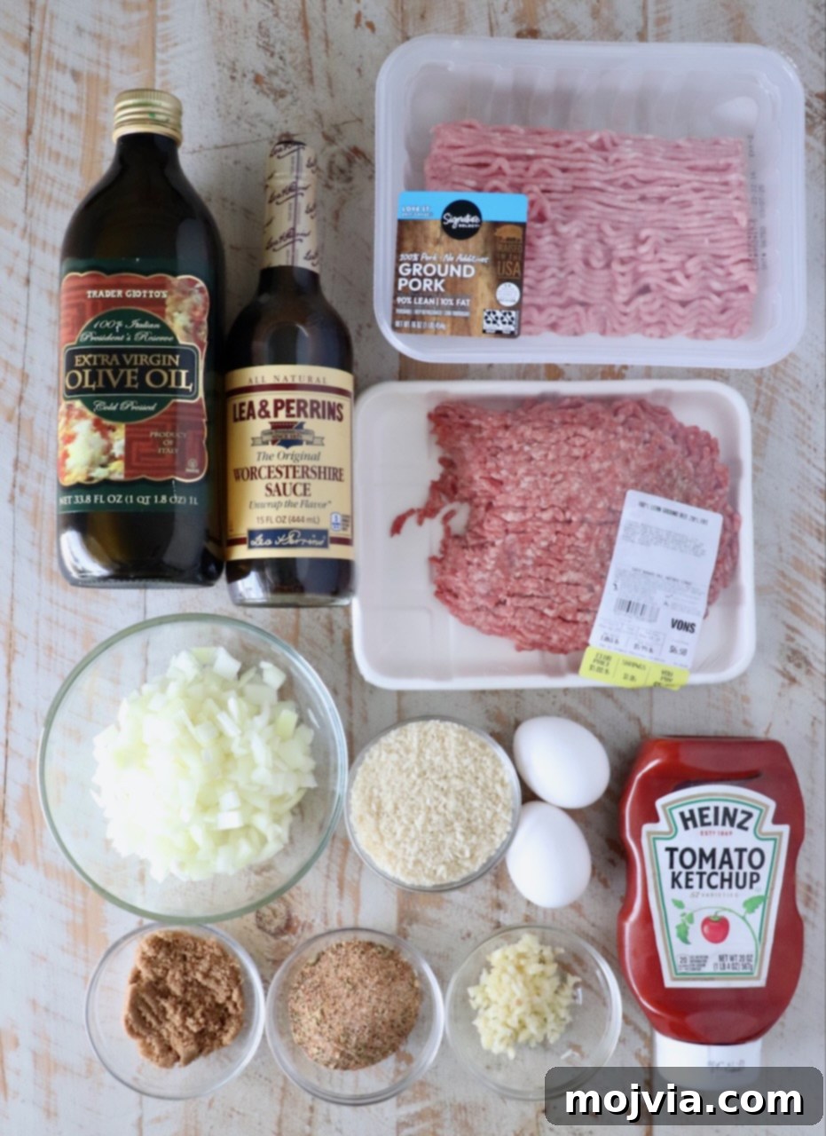 Perfect Air Fryer Meatloaf 3 ingredients for air fryer meatloaf on a white wood board