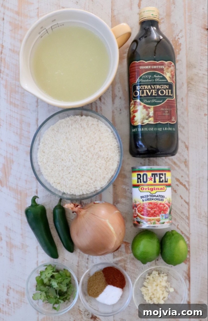 Speedy Instant Pot Mexican Rice 3 Fresh ingredients laid out on a white wooden board, ready for making Instant Pot Mexican rice