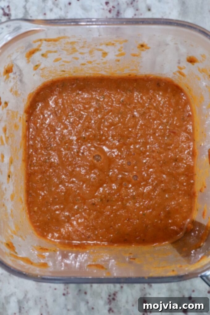 Smooth, pureed adobo sauce in a blender