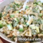 Esquites Style Corn Salad 11 Mexican street corn salad in a bowl with a fork